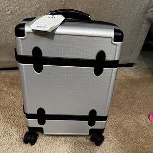CALPAK Carryon luggage